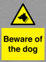 beware-of-the-dog-with-dog-warning-symbol~